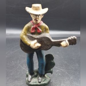 Vintage CAST IRON SINGING COWBOY BOTTLE OPENER w Guitar